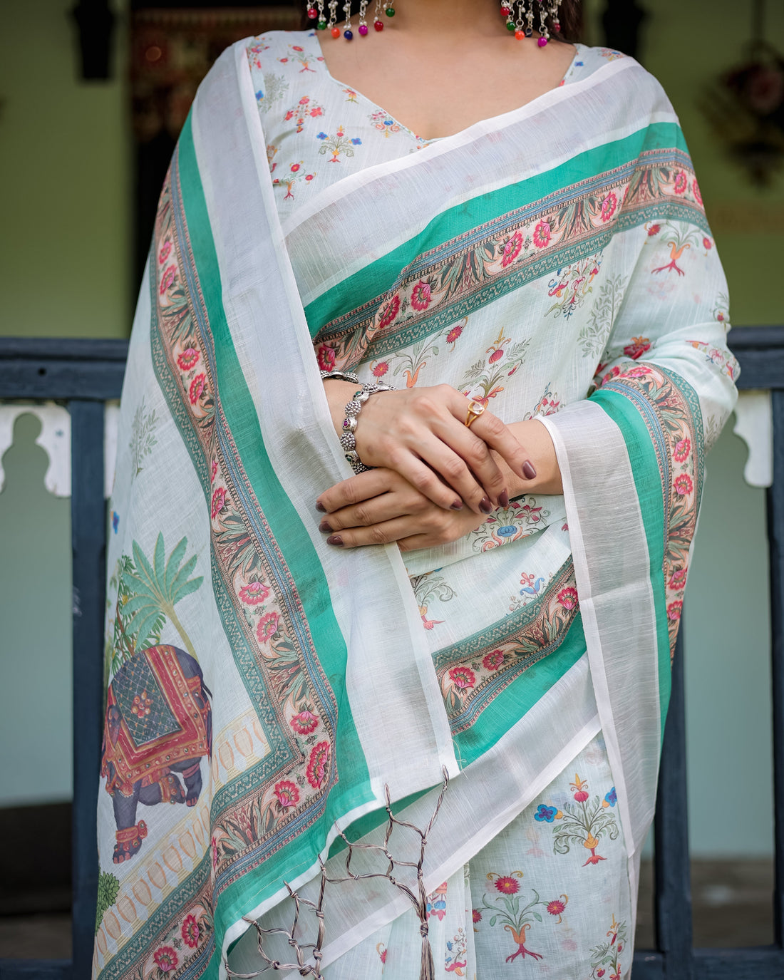 Ivory Pure Cotton Linen Saree with Elephant Motif and Floral Pattern, Green and Pink Color