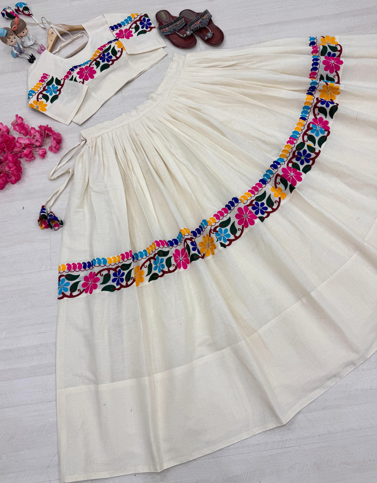 Lehenga drawstring with tassels and embroidered border, flat lay