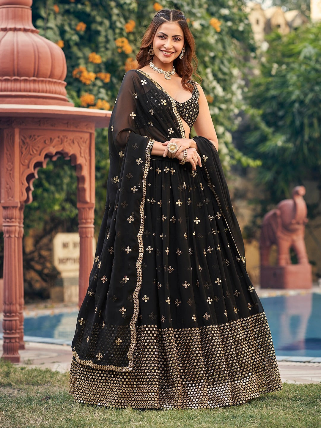 Black rahi lehenga with blouse and dupatta