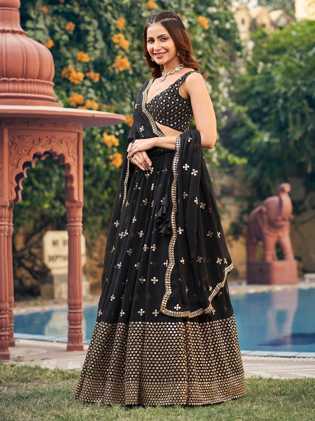 Black rahi lehenga with blouse and dupatta