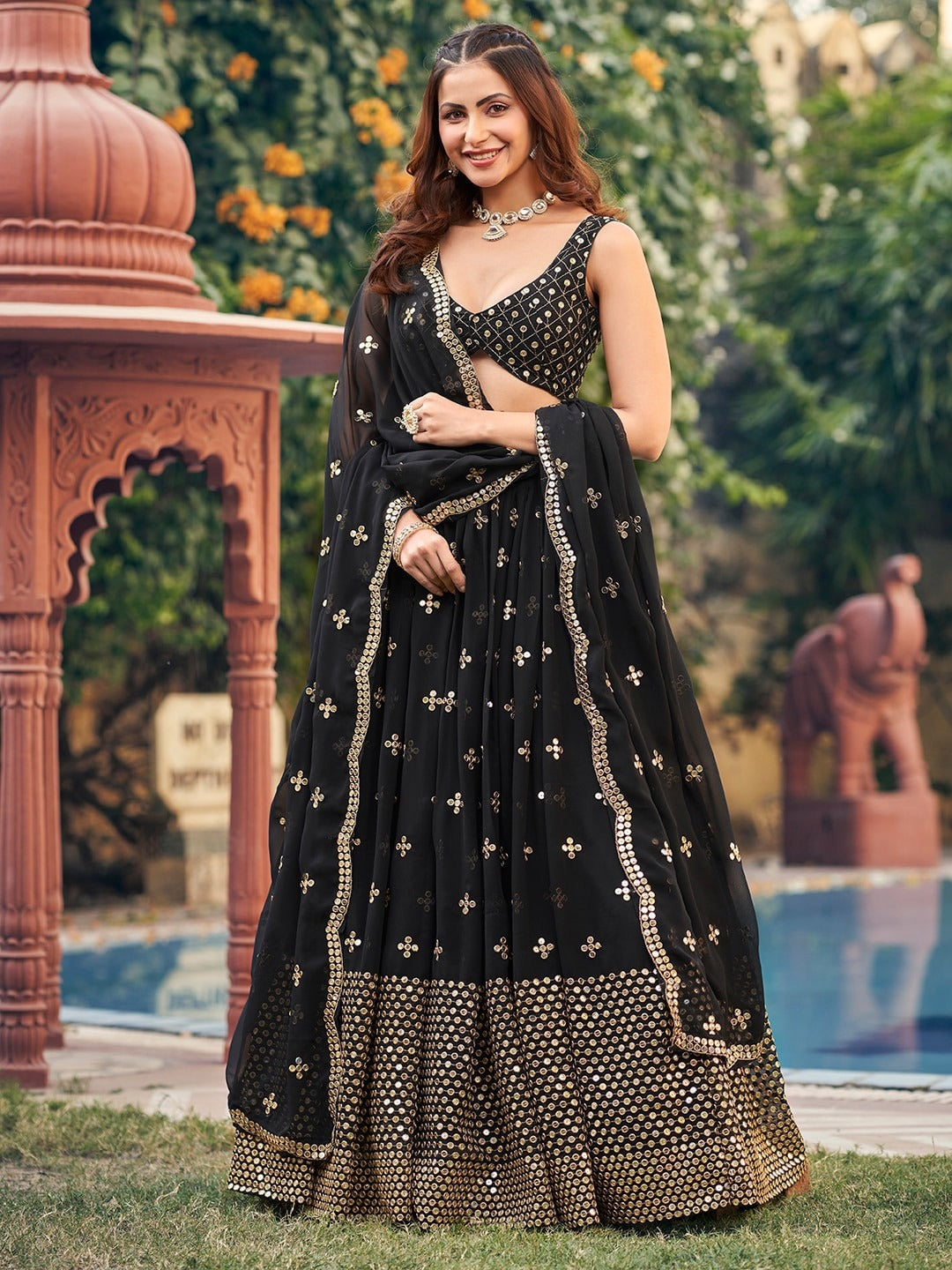 Black rahi lehenga with blouse and dupatta