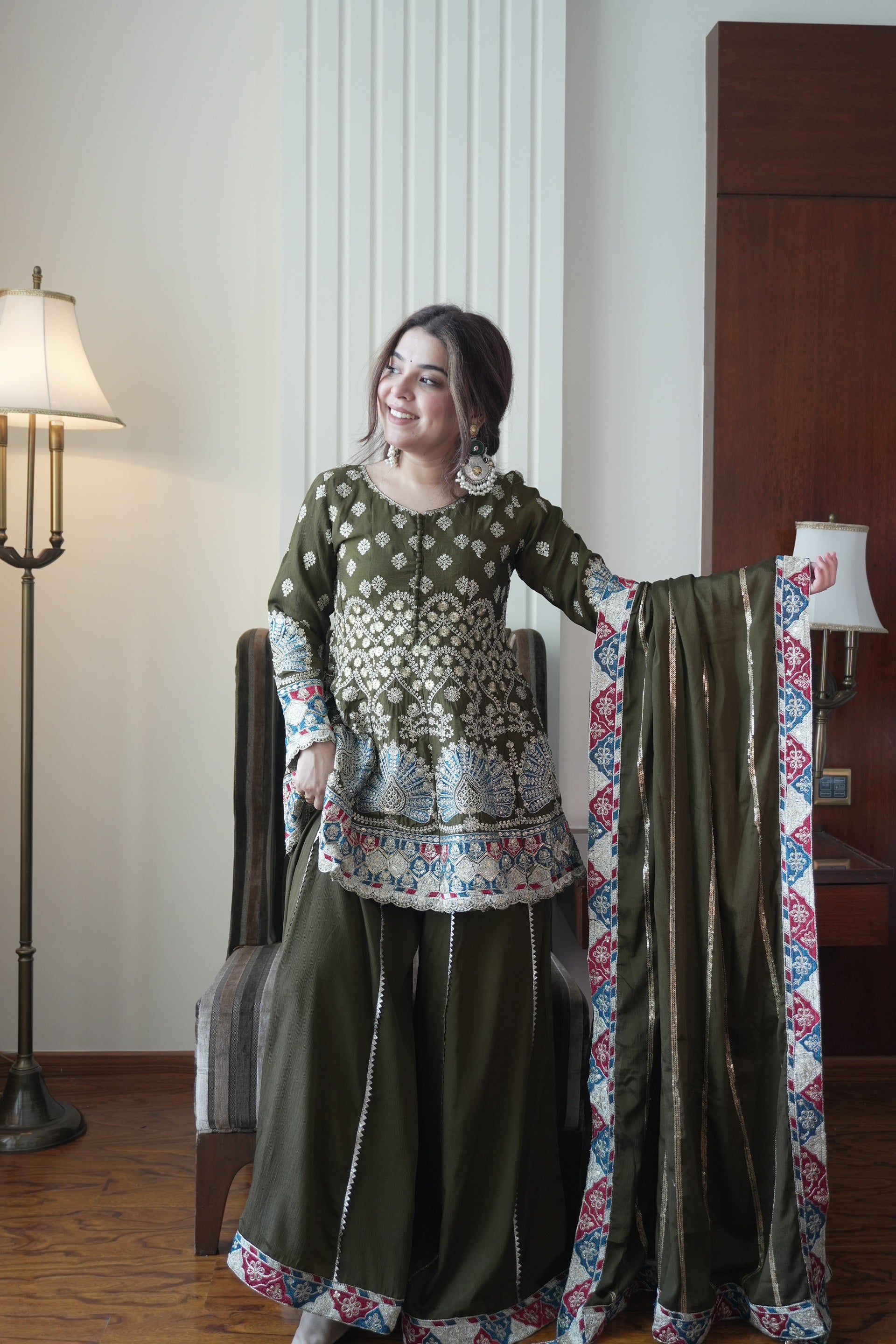 Olive Green Chinon Sharara Suit Features Intricate Multi-Colored Floral Embroidery
