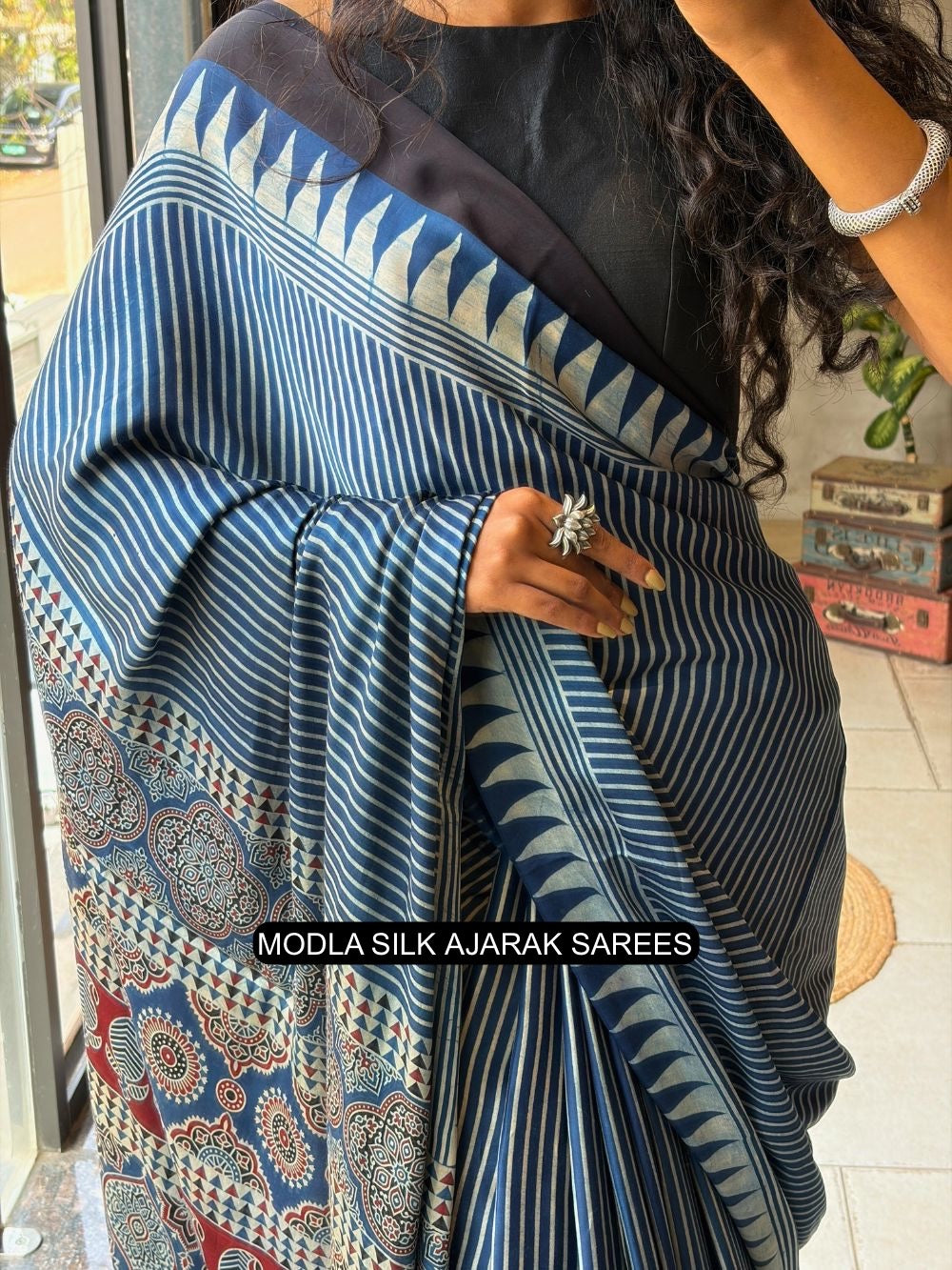 Steel Blue Modal Silk Ajrakh Printed Saree with Striped Design, Heritage Pallu & Tassel Detailing