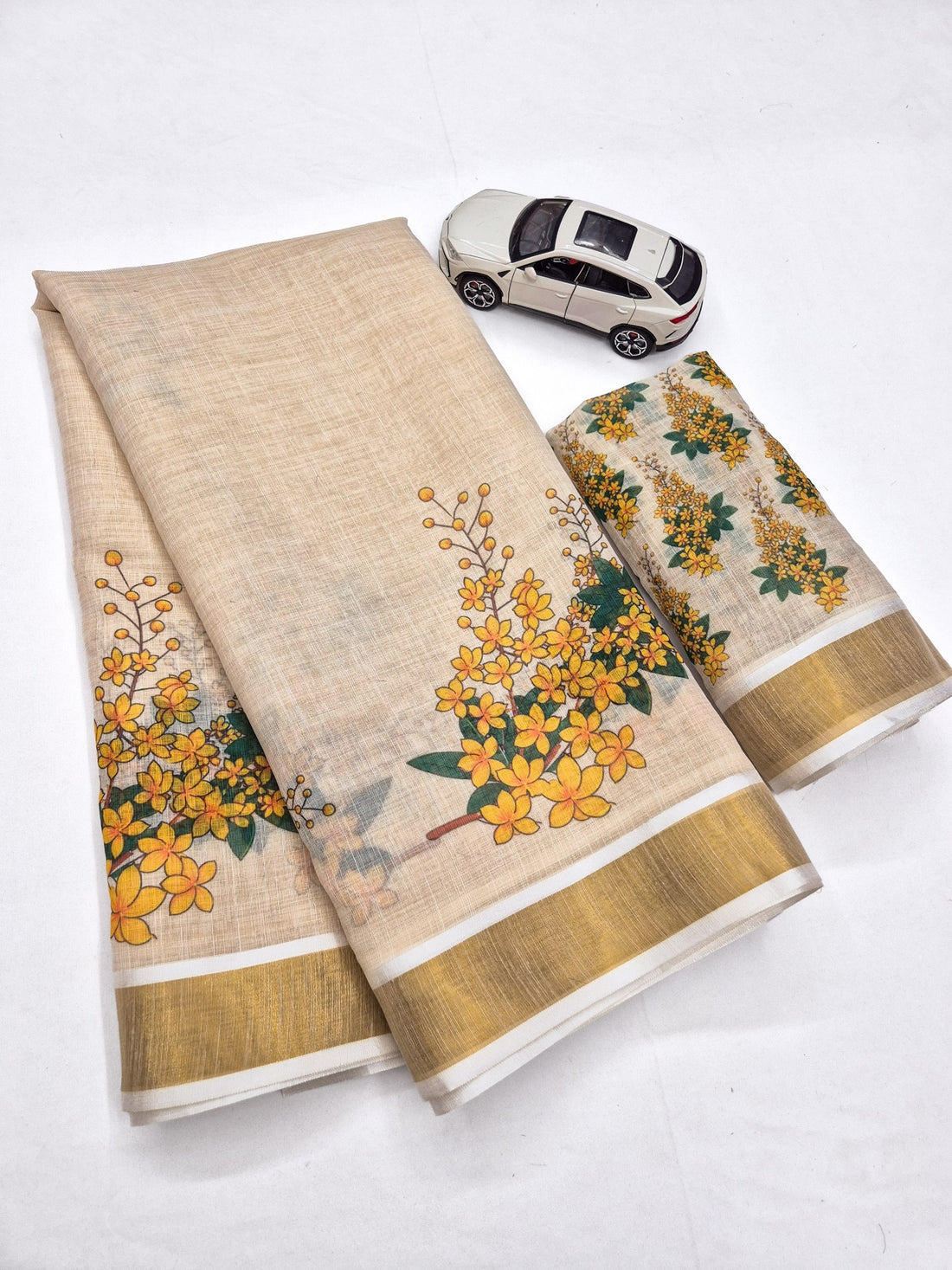 Yellow Linen Floral Print Saree with Zari Border
