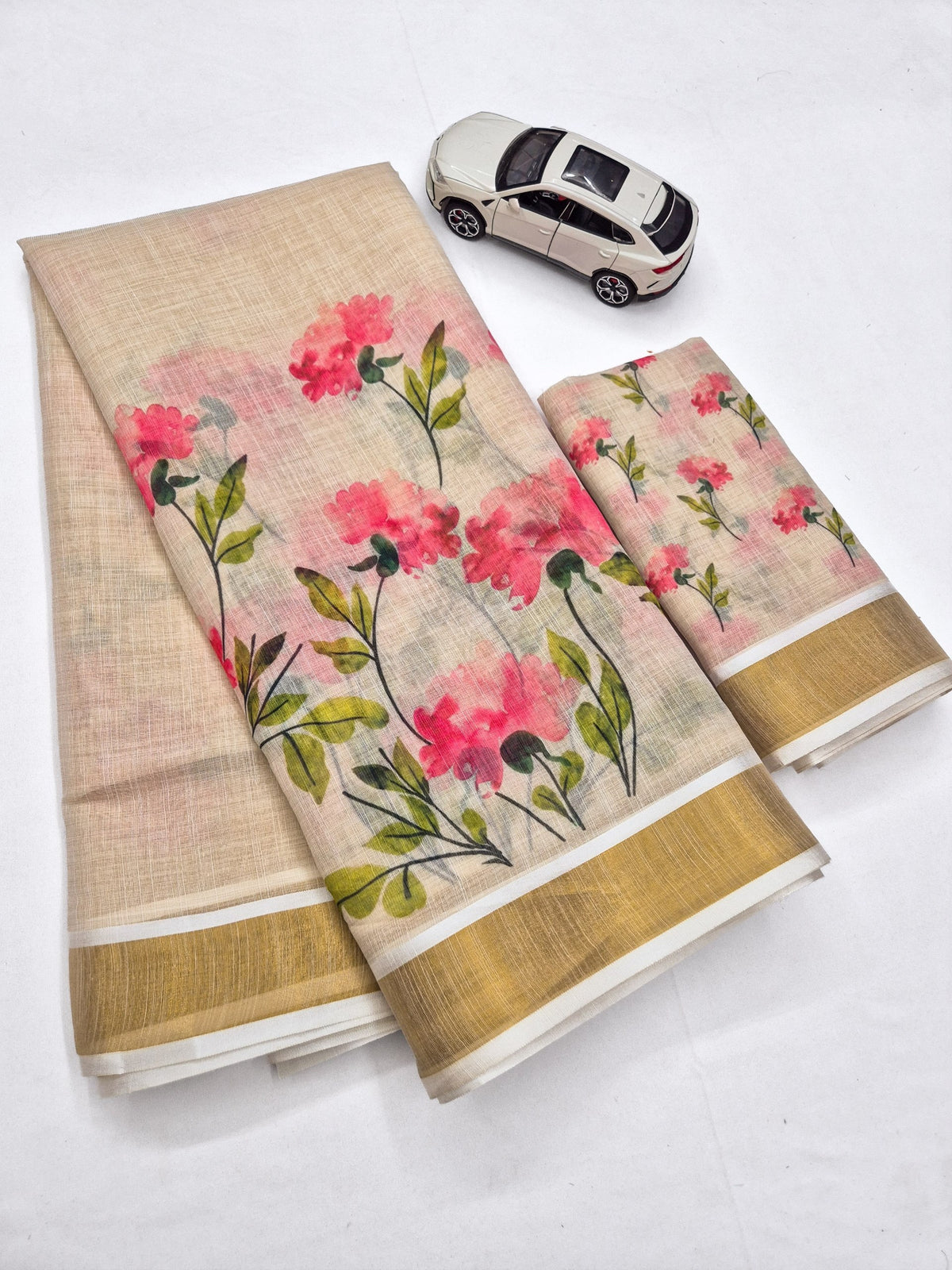 Pink Linen Floral Print Saree with Zari Border