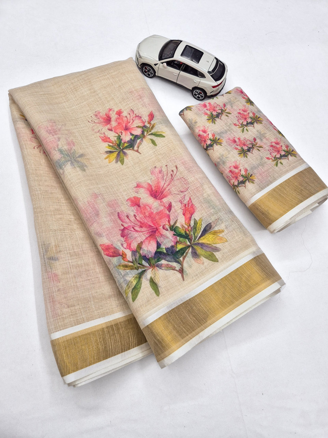 Baby Pink Linen Floral Print Saree with Zari Border