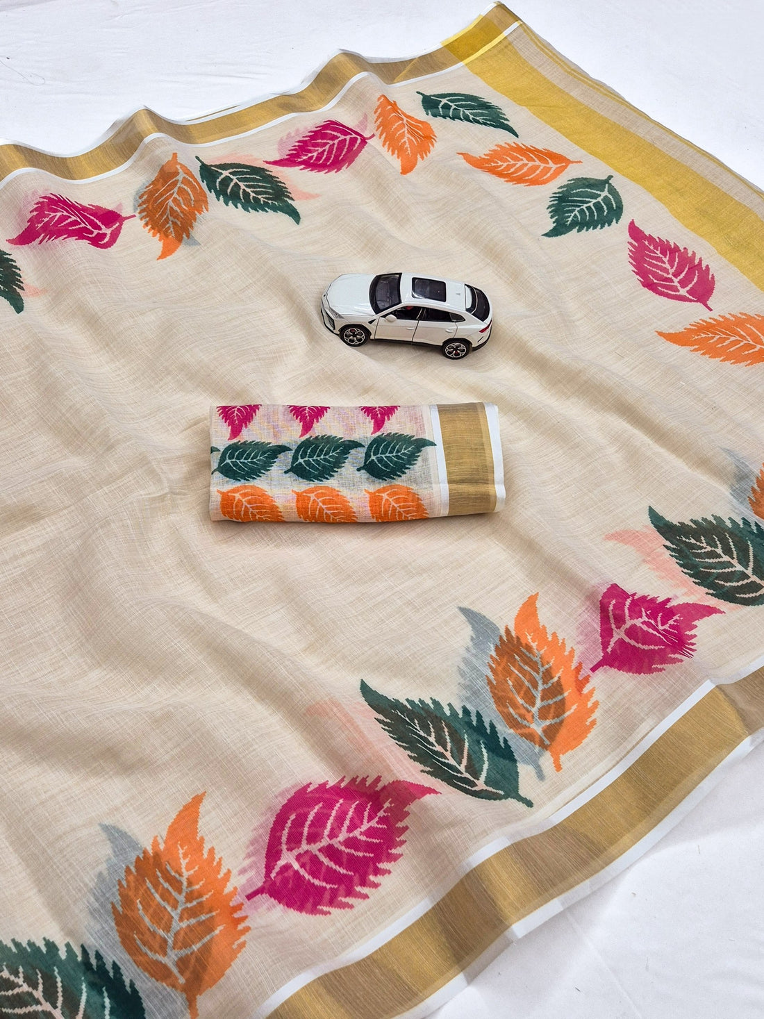 Orange and Green Linen Floral Print Saree with Zari Border