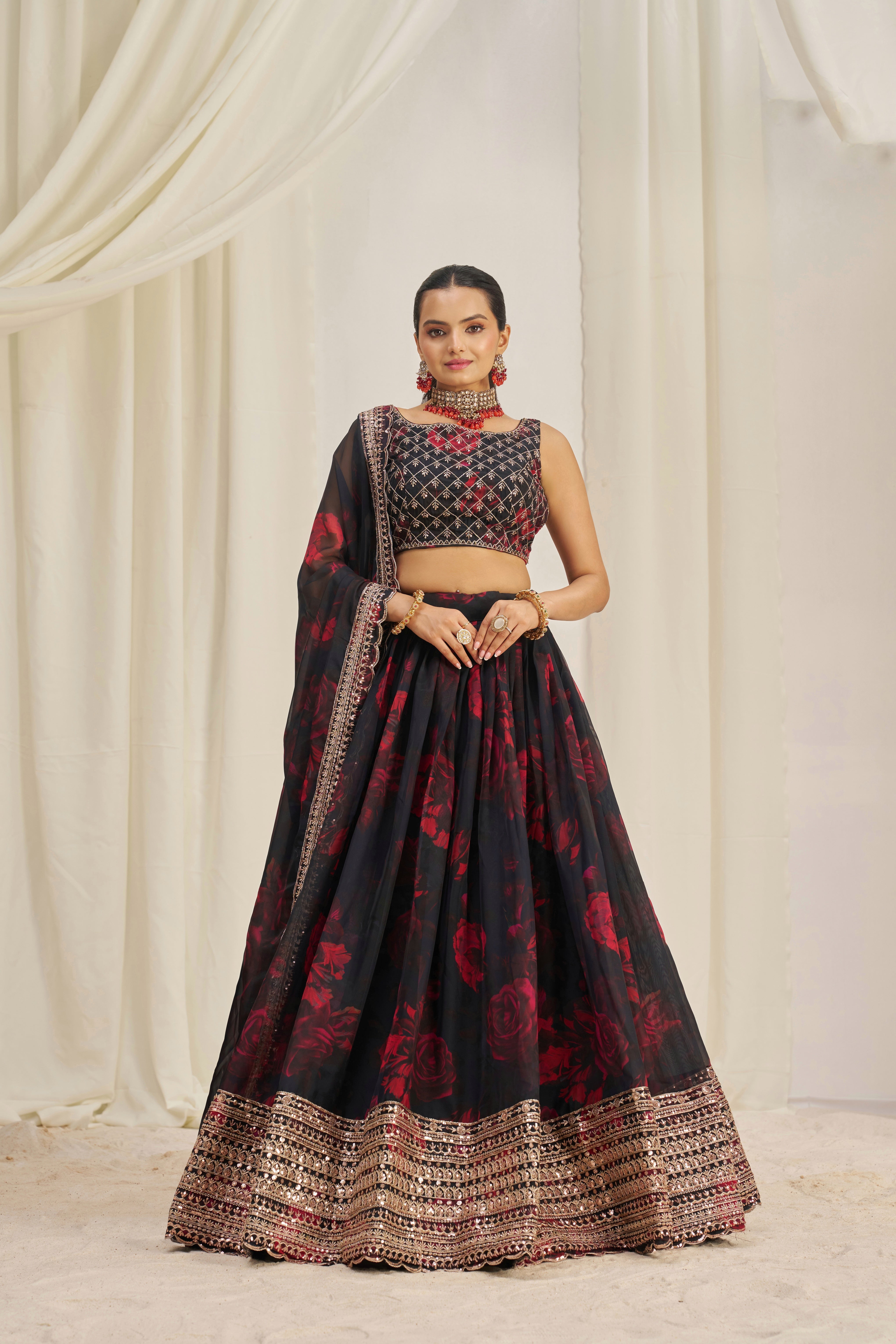 Black Organza Lehenga Choli Featuring Red Floral Prints