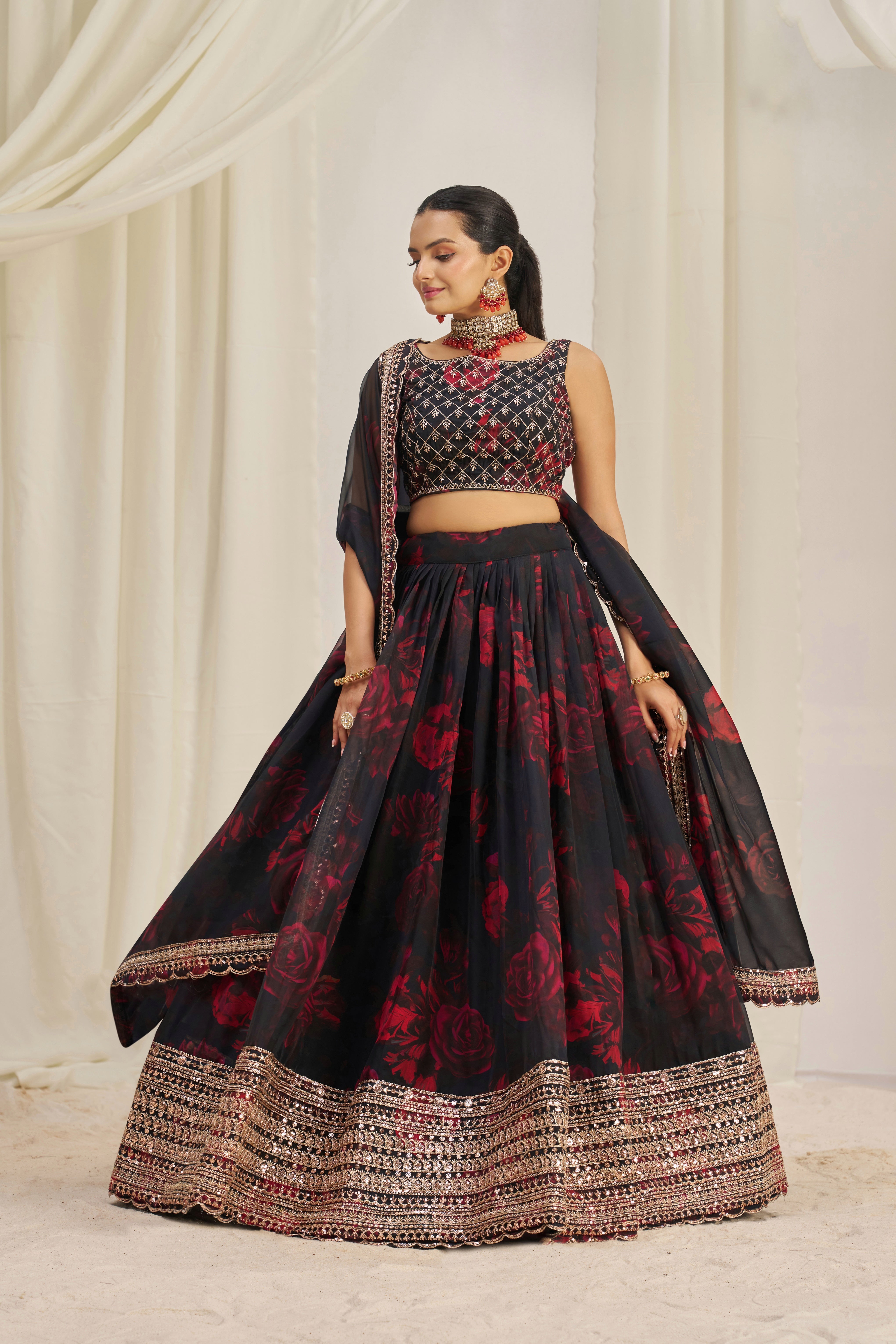 Black Organza Lehenga Choli Featuring Red Floral Prints